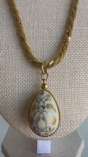 Load and play video in Gallery viewer, Vintage Golden Egg necklace
